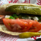 Close-up of Portillo's plant-based hot dog with Chicago-style toppings